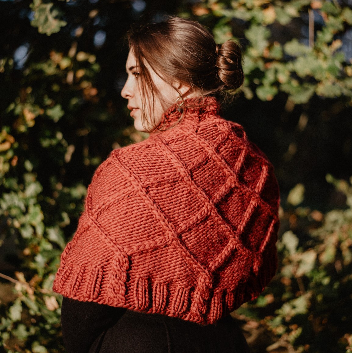 A picture of the Merlot cable poncho.